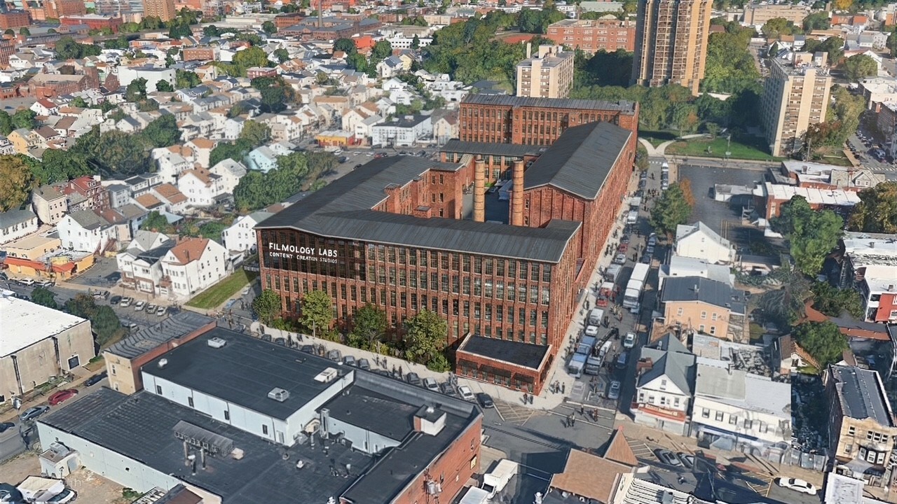 Shot of Filmology Labs large brick building from the air.
