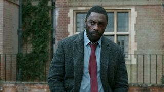Idris Elba in his classic coat as John Luther in Luther: The Fallen Sun.