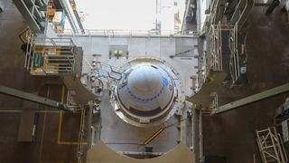 Boeing's Starliner for the OFT-2 mission is pictured inside the Vertical Integration Facility, at Space Launch Complex 41 at Cape Canaveral Space Force Station in Florida, on July 28, 2021.