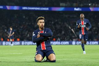 Desire Doue of Paris Saint-Germain celebrates scoring his team's first goal during the UEFA Champions League 2024/25 Quarter Final First Leg match between Paris Saint-Germain and Aston Villa FC at Parc des Princes on April 09, 2025 in Paris, France.