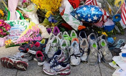 A makeshift memorial lies near the site of the finish line of the Boston Marathon. 