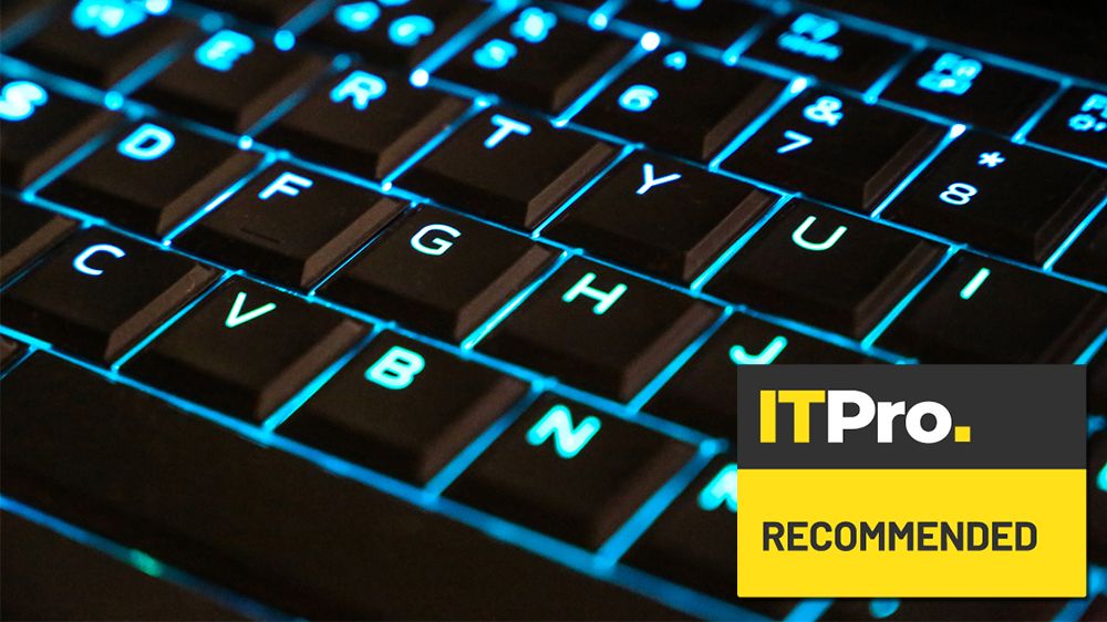 A closeup of a backlit keyboard overlaid with the IT Pro Recommended Award logo