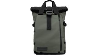 Product photo of a green Wandrd Prvke backpack with the top rolled down