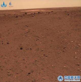 A view of the flat terrain around China's Mars rover Zhurong near its Utopia Planitia landing site released by the China National Space Administration on June 11, 2021.