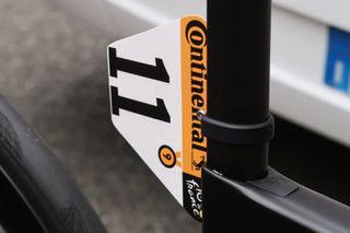 Tadej Pogacar's race number with a sticker of the number 9