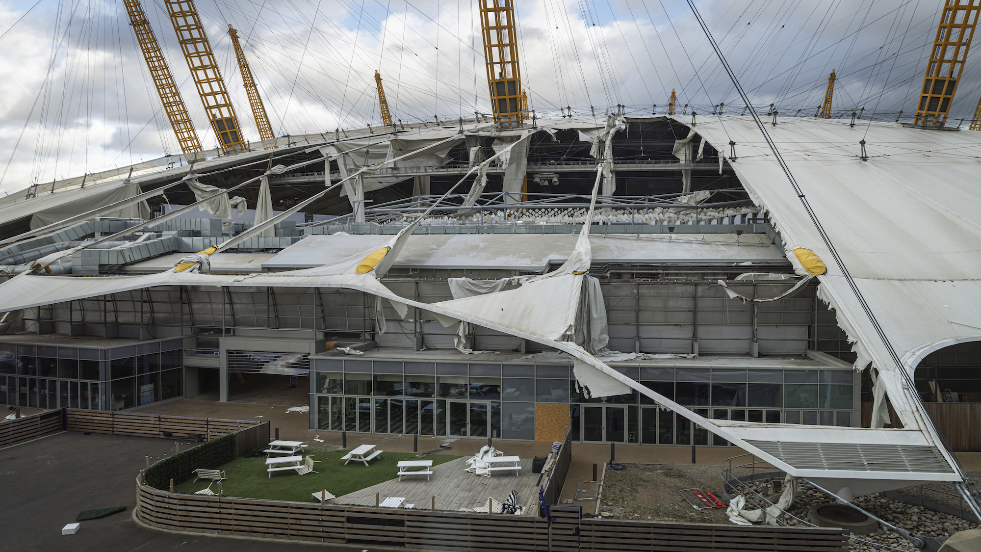 The roof of London's 02 Arena was left shredded by the storm.