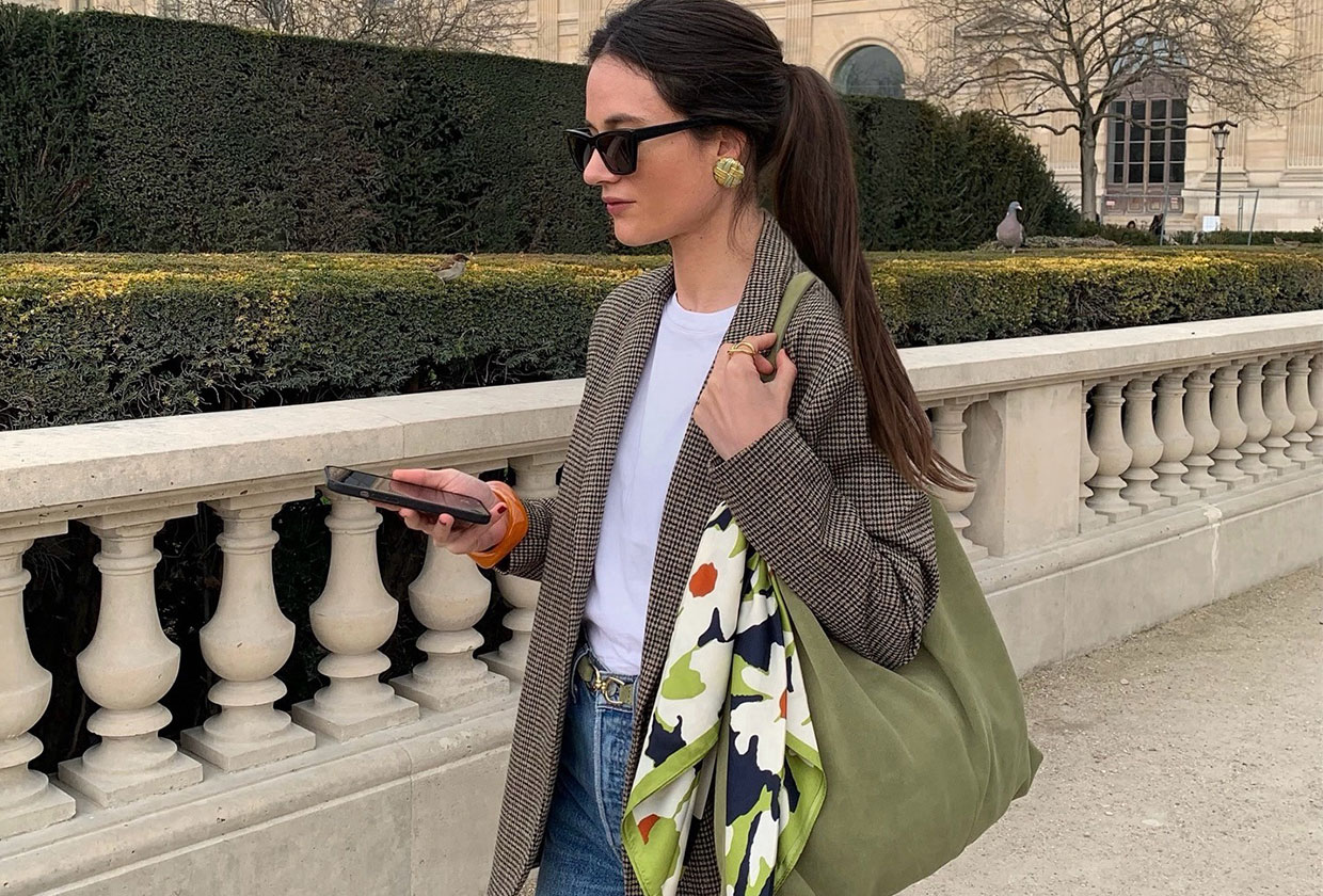 A French woman with jeans and a blazer
