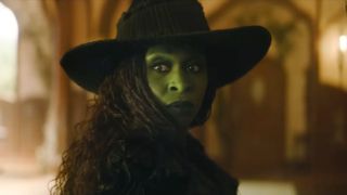Cynthia Erivo as Elphaba in Wicked: For Good looking over her left shoulder.