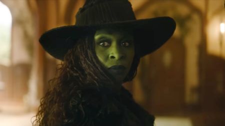 Cynthia Erivo as Elphaba in Wicked: For Good looking over her left shoulder.