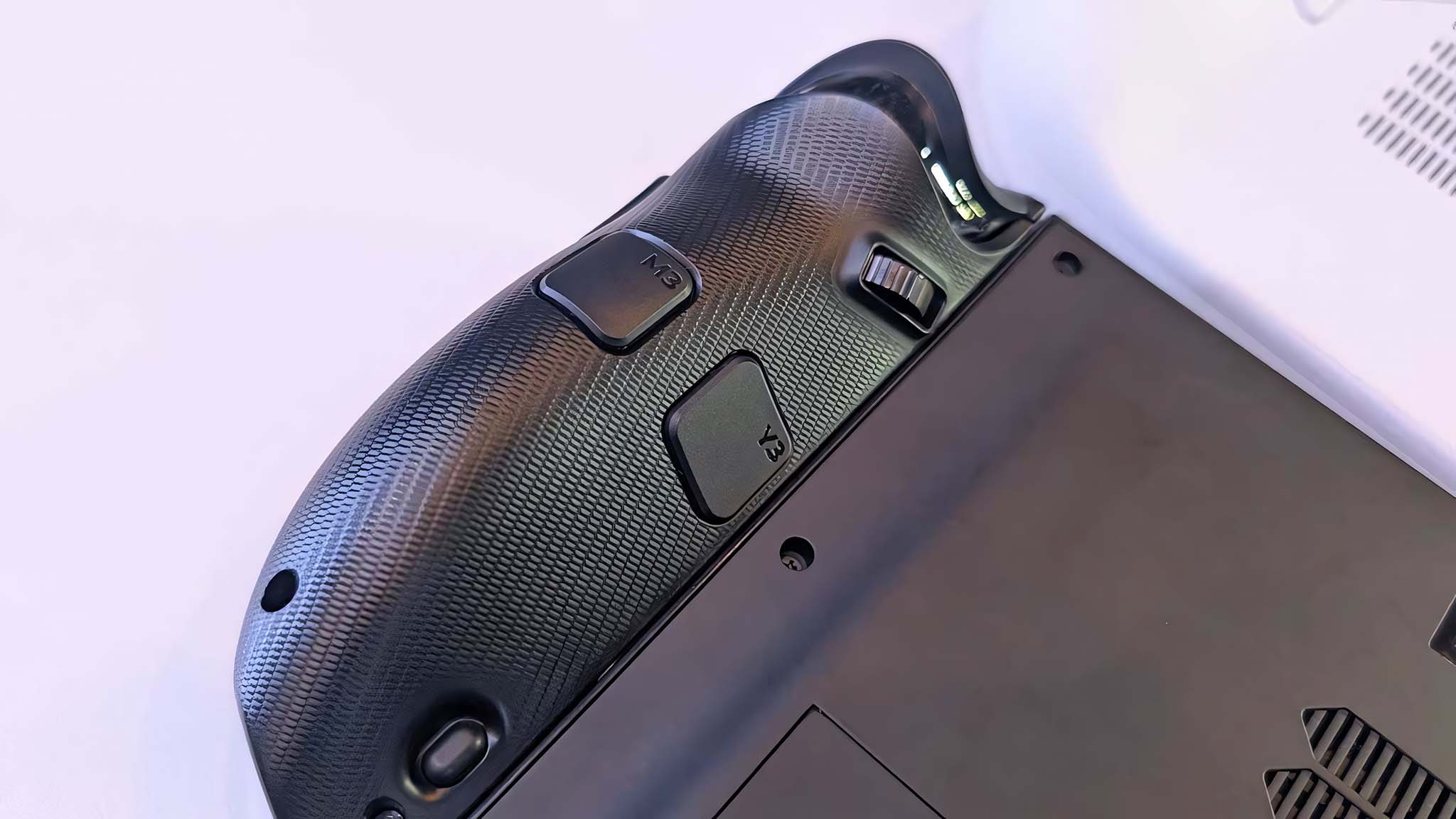 Closeup of Lenovo Legion Go 2 mouse wheel and back buttons.