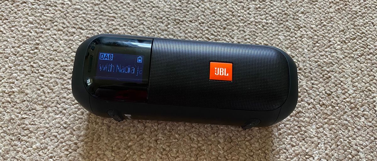 JBL Tuner 2 on brown background