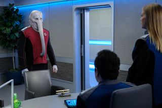 Alara (Halston Sage) has an interim replacement, Lt. Tharl (Patrick Warburton), who is an alien with a "crazy high metabolism" and two esophagi.