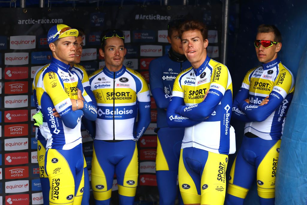 MO I RANA NORWAY AUGUST 11 Kenneth Van Rooy of Belgium Milan Fretin of Belgium Arne Marit of Belgium Jens Reynders of Belgium Ward Vanhoof of Belgium Aaron Van Poucke of Belgium and Team Sport Vlaanderen Baloise during the team presentation prior to the 9th Arctic Race Of Norway 2022 Stage 1 a 1868km stage from Mo i Rana to Mo i Rana ArcticRace on August 11 2022 in Mo i Rana Norway Photo by Michael SteeleGetty Images