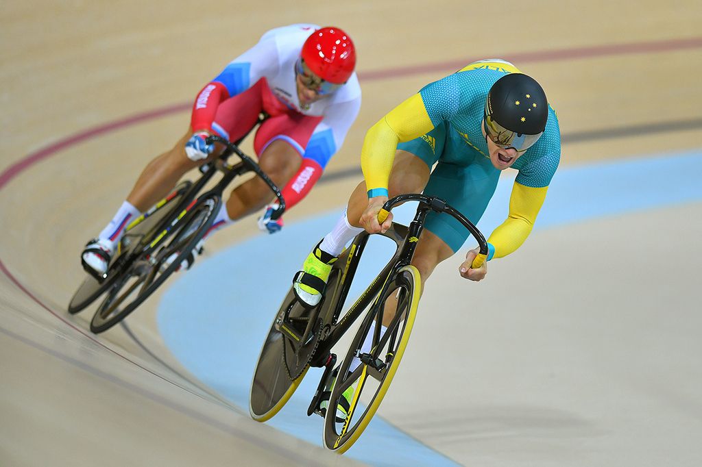 Matthew Glaetzer (Australia) gets ahead of Denis Dmitriev (Russia) in the sprint for bronze