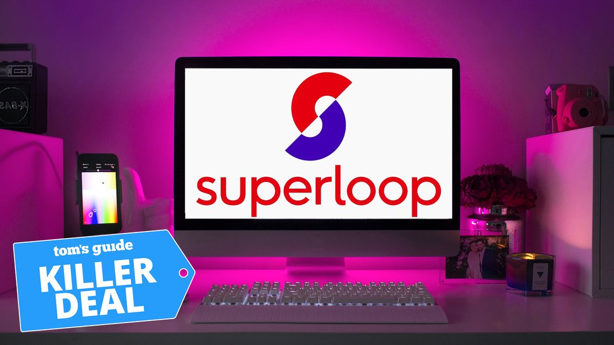 Superloop logo on computer screen, on desk. Pink light hue behind computer screen and Tom&#039;s Guide Killer Deals badge on bottom left corner