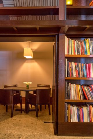 Bookshelves and seating at The Mercer hotel library