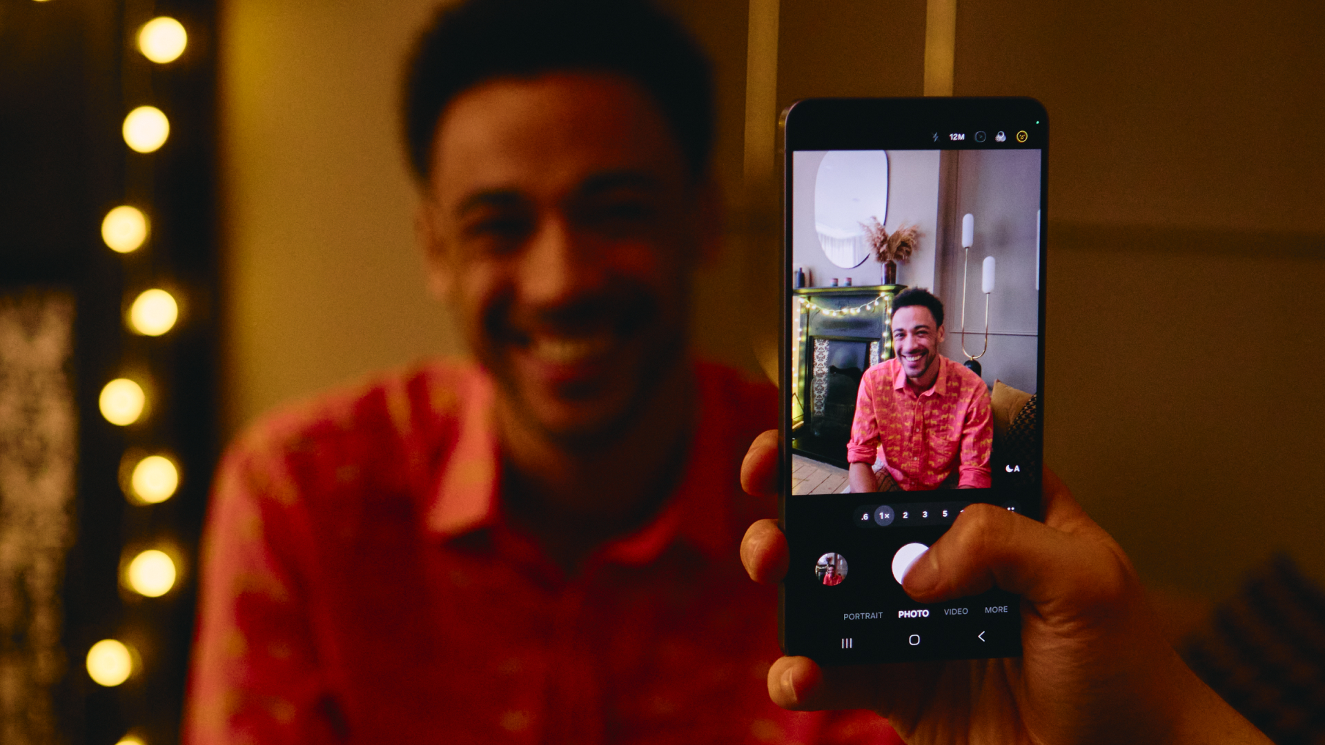 Someone takes a portrait photo on a Samsung Galaxy S26 Ultra