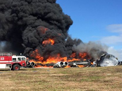 The wreckage of a B-52 bomber that crashed Wednesday in Guam.