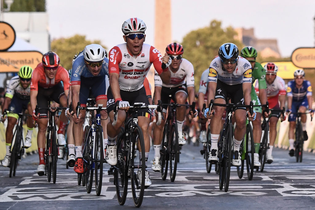 Australias Caleb Ewan C celebrates as he wins on the finish line of the 21st and last stage of the 106th edition of the Tour de France cycling race between Rambouillet and Paris ChampsElysees in Paris in Paris on July 28 2019 Photo by AnneChristine POUJOULAT AFP Photo credit should read ANNECHRISTINE POUJOULATAFP via Getty Images