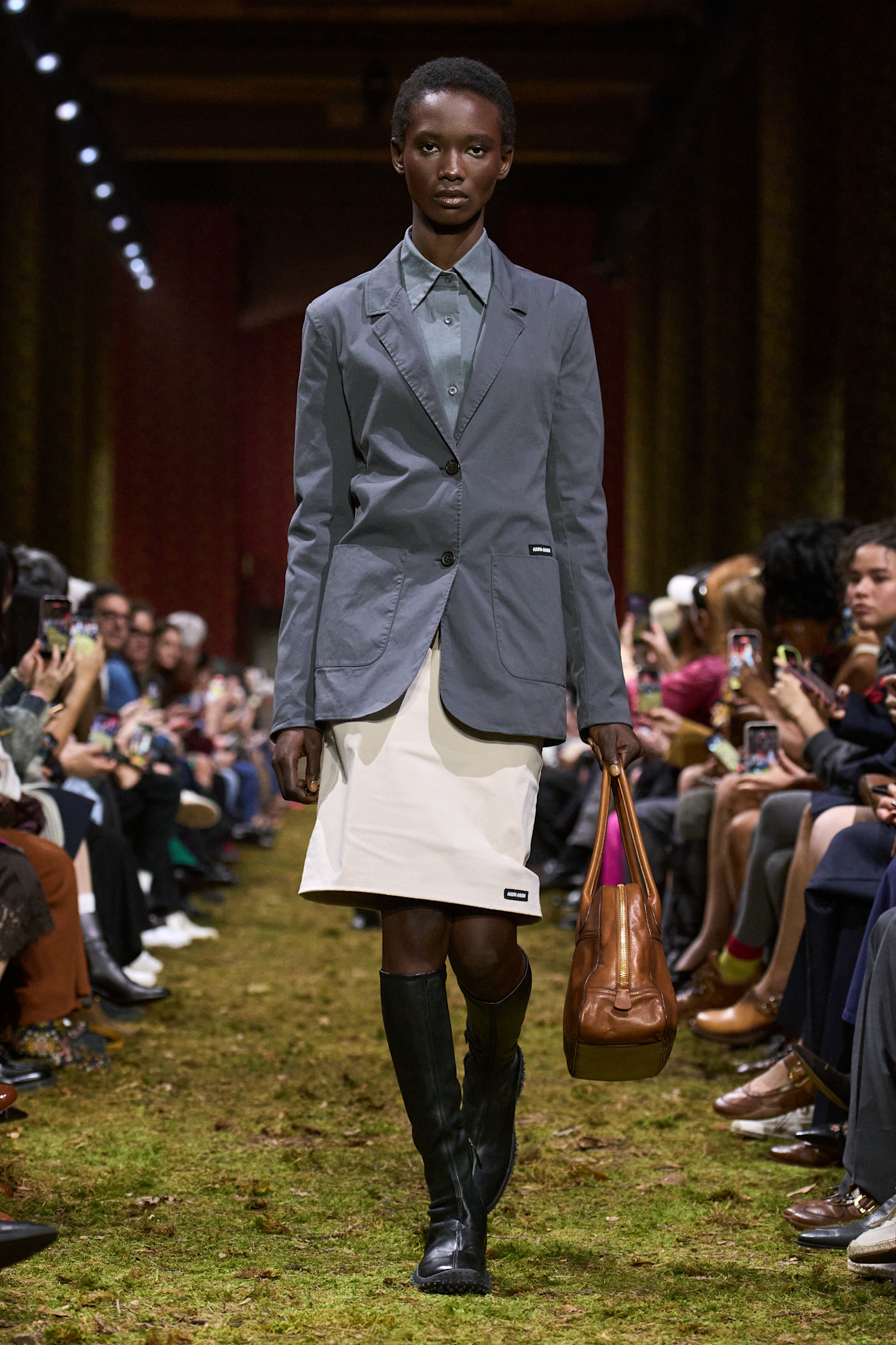 Model on the Miu Miu fall/winter 2026 runway.