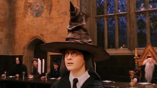 Harry wearing the sorting hat.