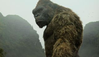 Kong stands in the mists of Skull Island in Kong: Skull Island