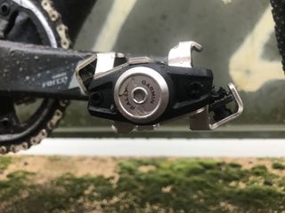 Image shows the Garmin Rally XC200 power meter pedals mounted on a gravel bike