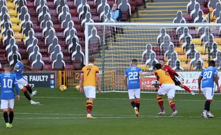 Rangers’ James Tavernier scores from the spot against Motherwell