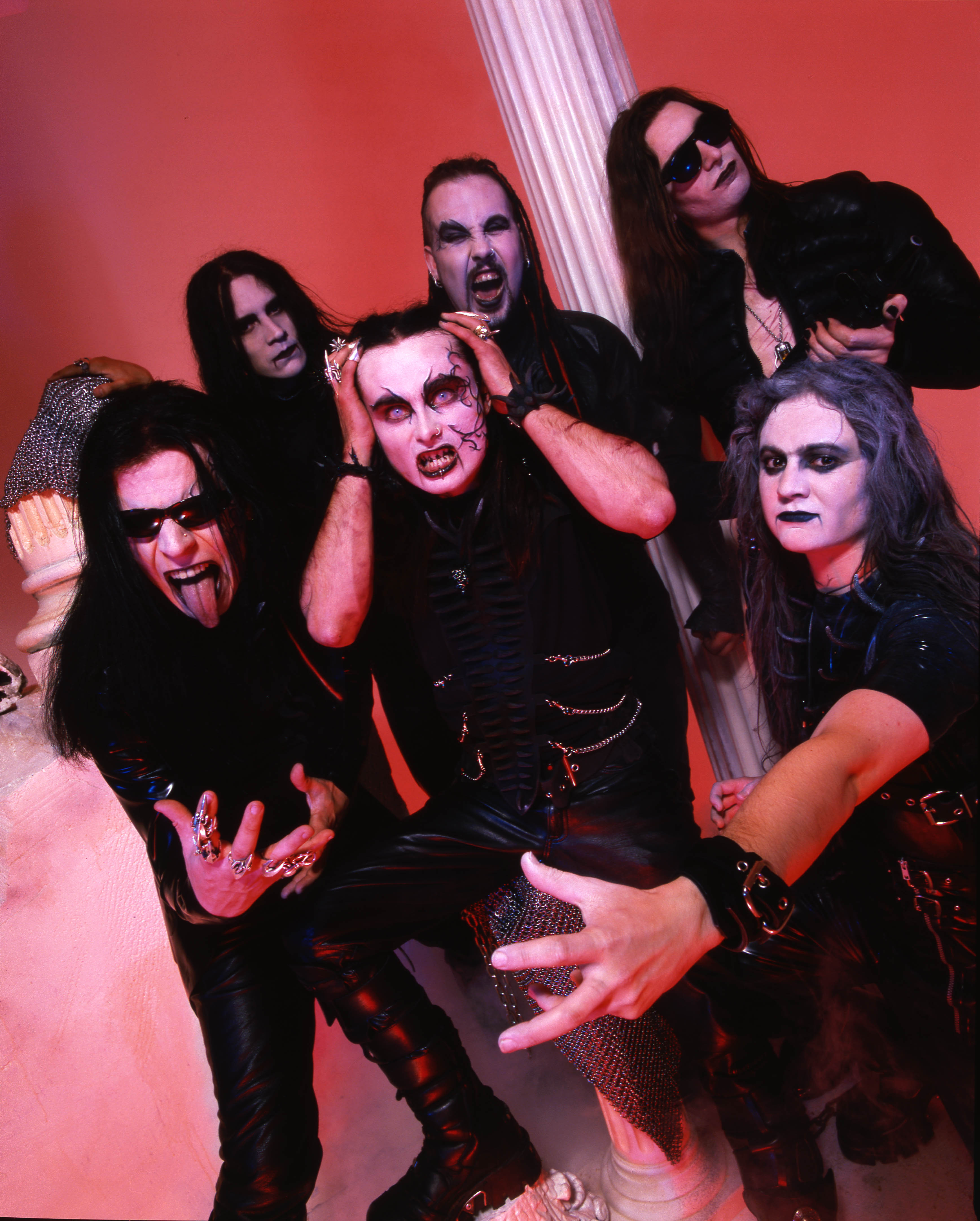 Cradle Of FIlth at an altar surrounded by fog
