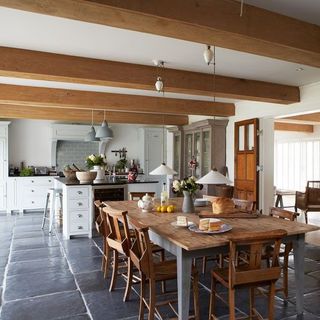 farmhouse kitchen with attached dining area