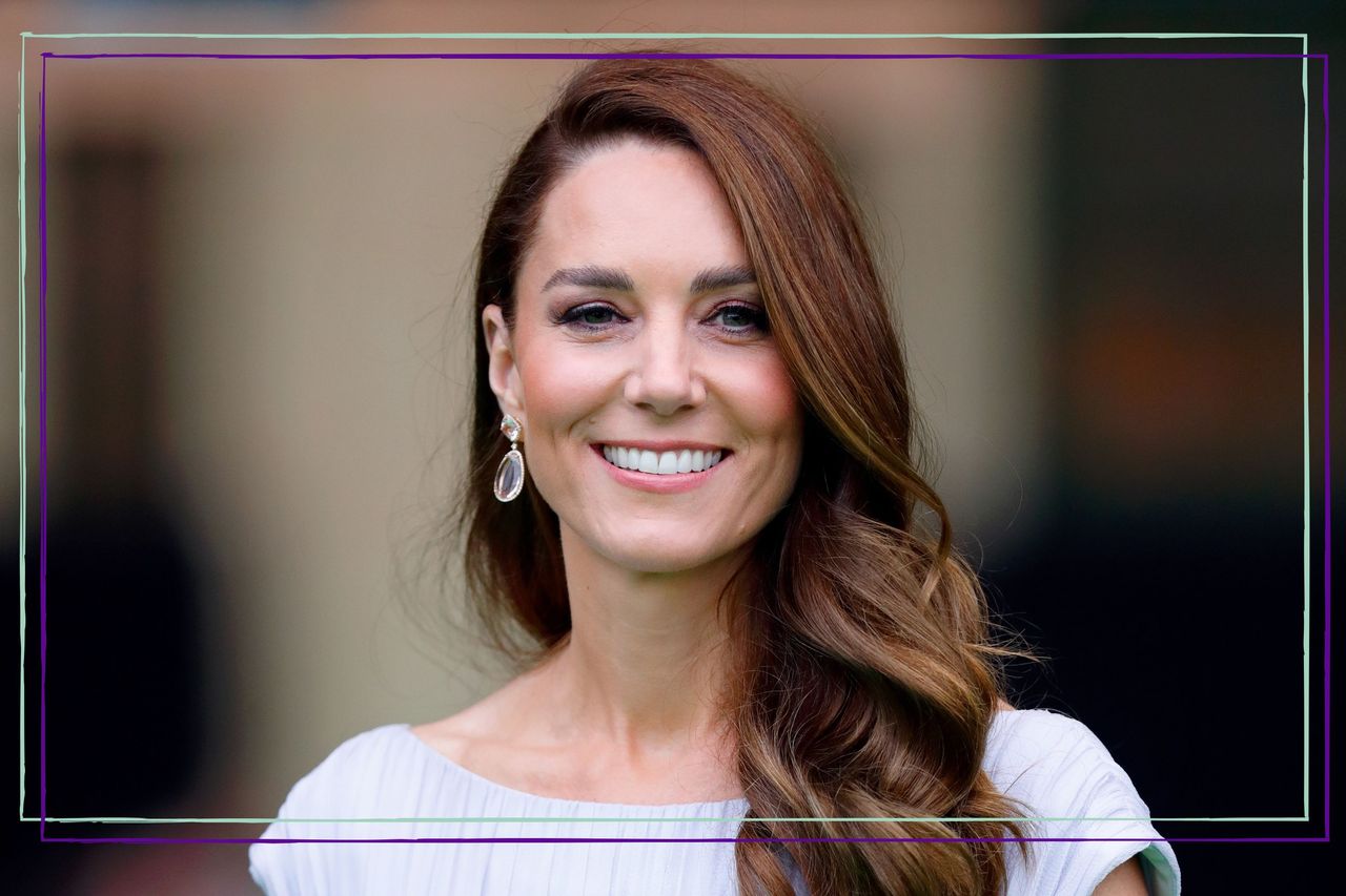 Kate Middleton smiles and wears a blue dress as she attends the Earthshot Prize 2021 at Alexandra Palace on October 17, 2021 in London, England. 