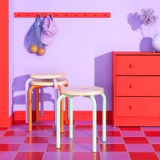 Purple room with red furniture