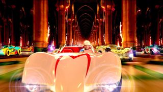 A still from the movie Speed Racer of a car moving at high speed in a neon CGI environment.