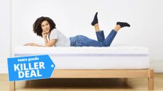 A woman lays on her stomach on the Hleix Plush Mattress Topper