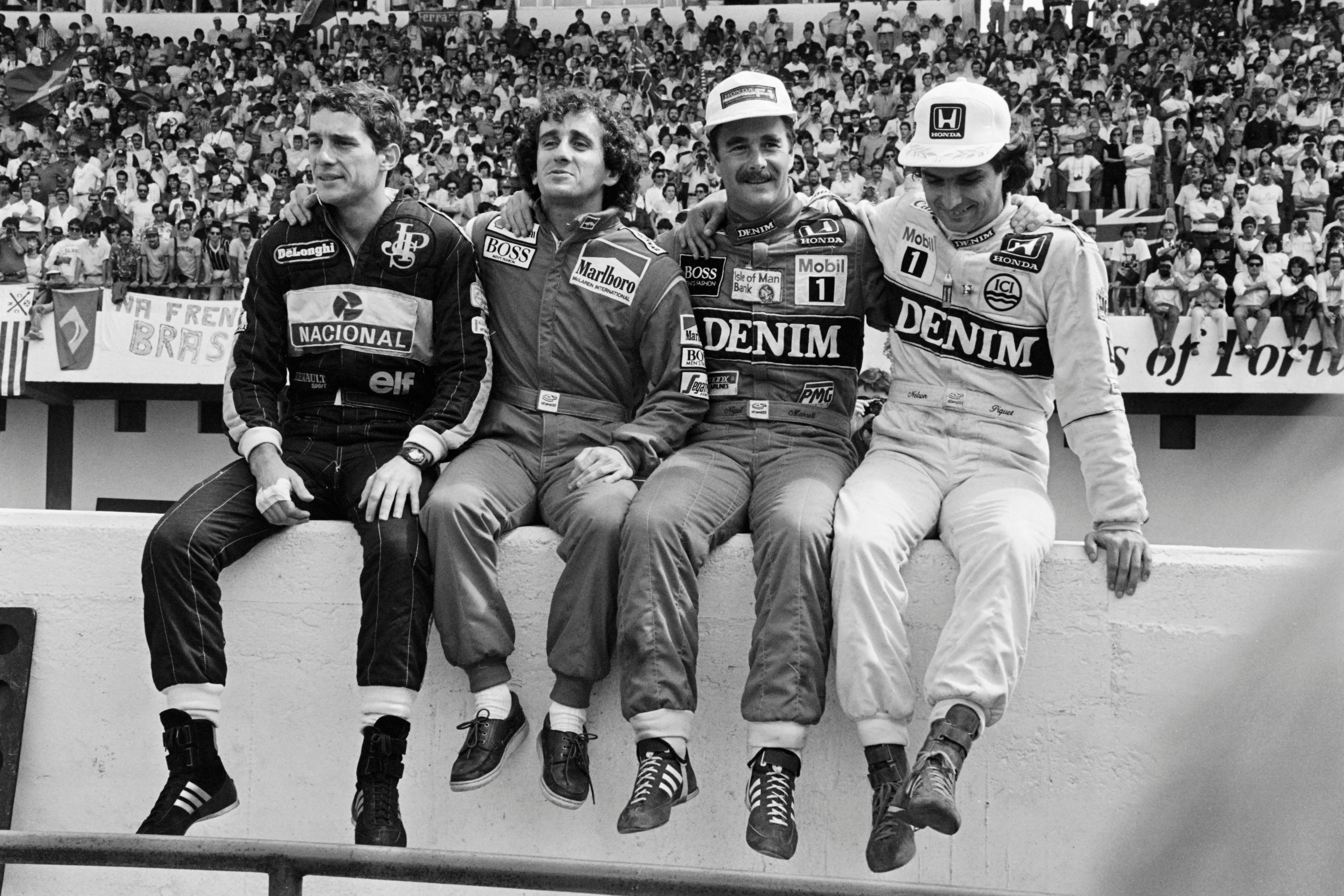 Ayrton Senna, Alain Prost, Nigel Mansell, and Nelson Piquet pose for photographers