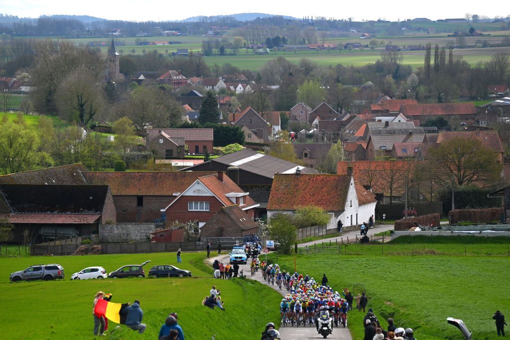WAREGEM BELGIUM MARCH 27 A general view of the peloton climbing to the climbing to the Kortekeer during the 78th Dwars Door Vlaanderen 2024 Mens Elite a 1886km one day race from Roeselare to Waregem UCIWT on March 27 2024 in Waregem Belgium Photo by Tim de WaeleGetty Images