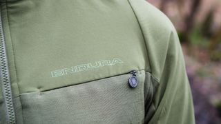 Detail of zippered pocket on the front of the Endura GV500 Long Sleeve Jersey