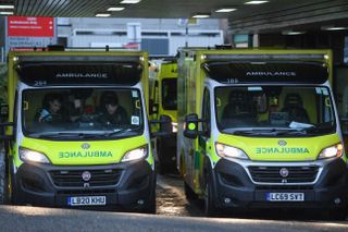 two ambulances parked outside Princess Alexandra Hospital Harlow A&E department