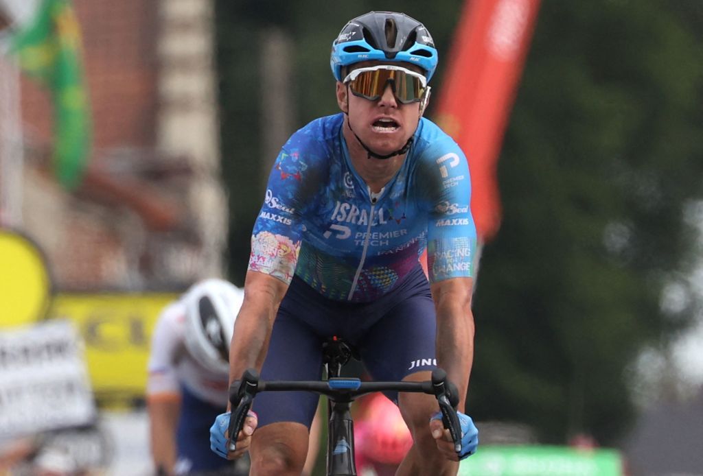IsraelPremier Tech teams Australian rider Simon Clarke sprints to the finish line to win the 5th stage of the 109th edition of the Tour de France cycling race 1537 km between Lille and Arenberg Porte du Hainaut in northern France on July 6 2022 Photo by Thomas SAMSON AFP Photo by THOMAS SAMSONAFP via Getty Images