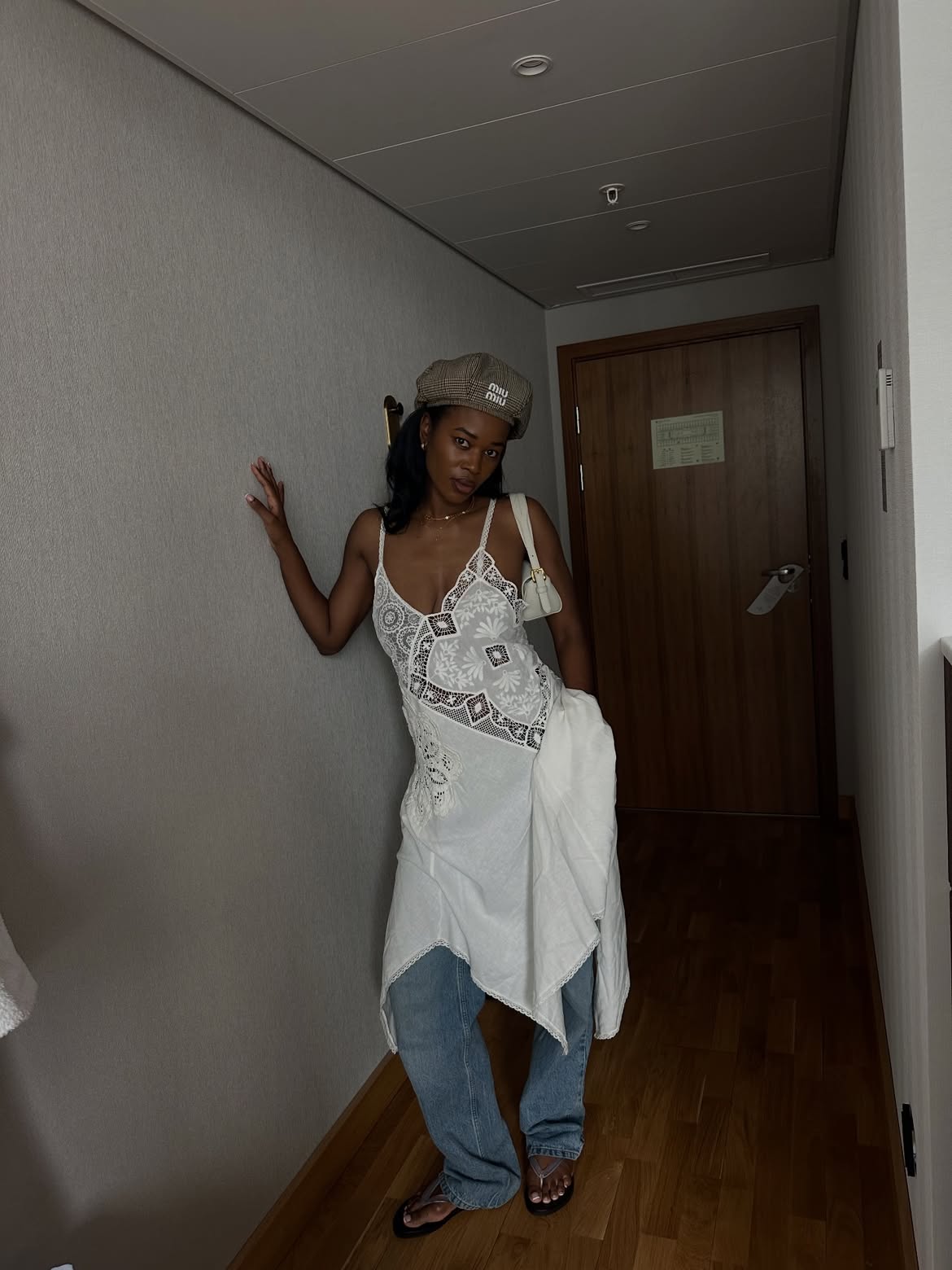 @nlmarilyn wears jeans white dress