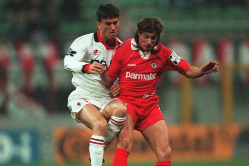 Benfica's Claudio Caniggia (right) is challenged by AC Milan's Christian Panucci in March 1995.