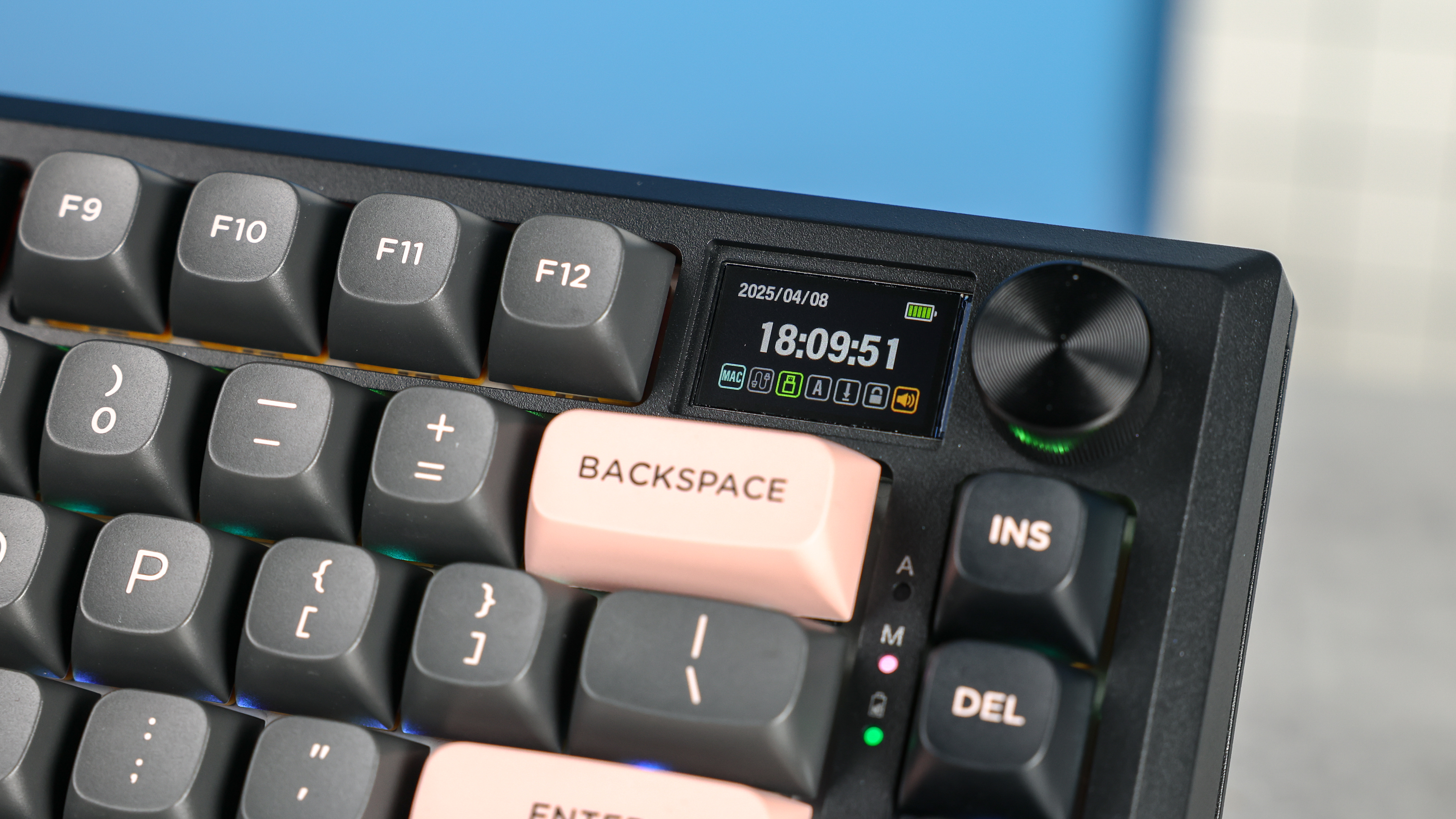Redragon Eclipse K720 Pro photographed in front of a blue background.