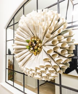 Rolled up book pages wreath
