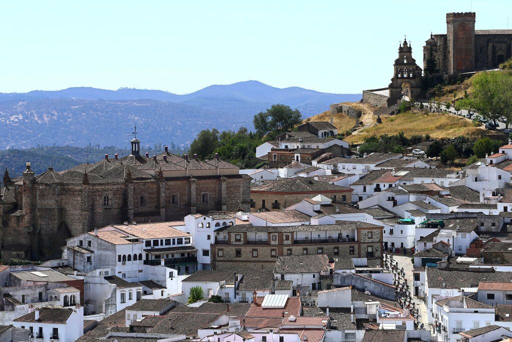 ARACENA SPAIN SEPTEMBER 07 A general view of the peloton passing through Aracena start village during the 77th Tour of Spain 2022 Stage 17 a 1624km stage from Aracena to Monasterio de Tentuda 1095m LaVuelta22 WorldTour on September 07 2022 in Aracena Spain Photo by Tim de WaeleGetty Images