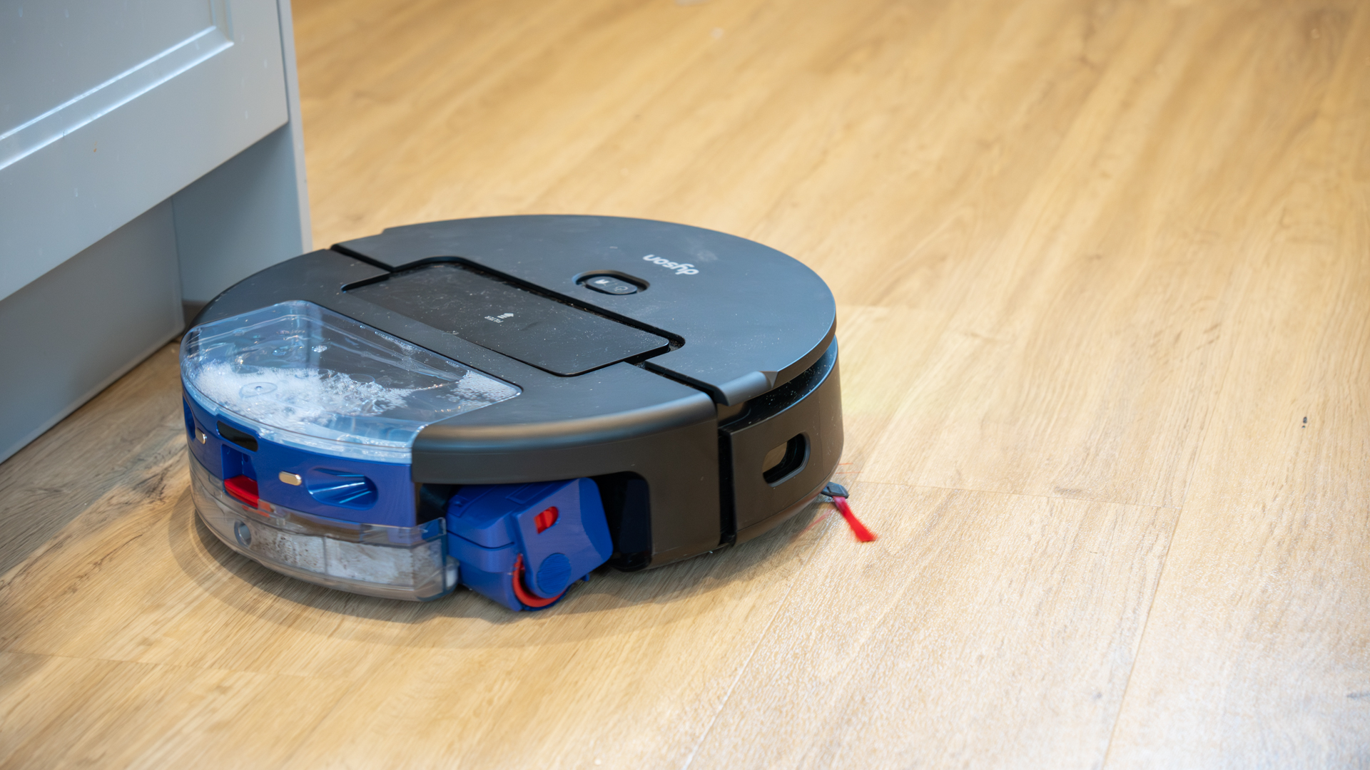 Dyson Spot+Scrub Ai robot vacuum in reviewer's kitchen