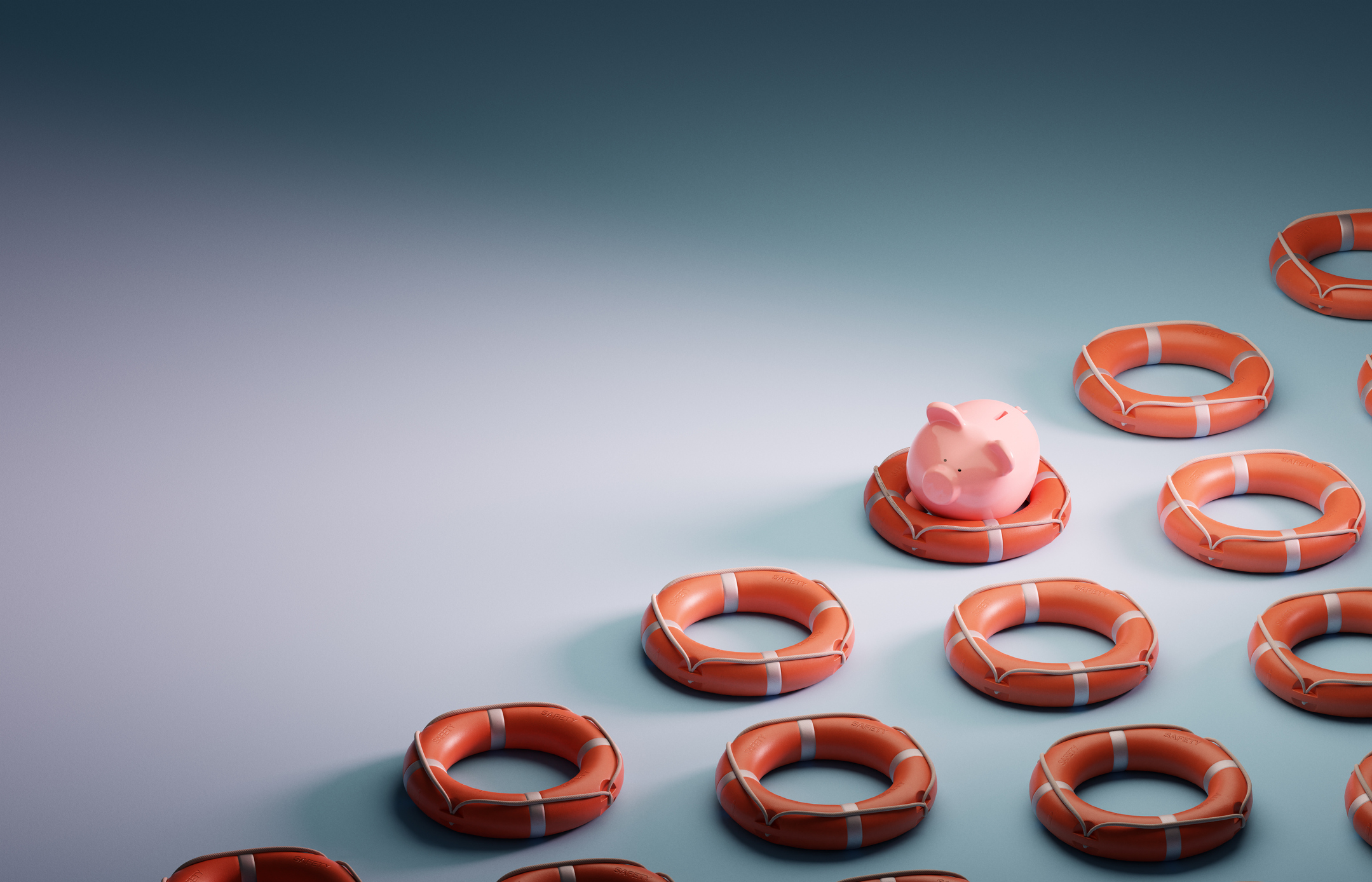 A single piggybank in a life ring with a grid pattern of empty life preservers covering half the image on a blue colored background