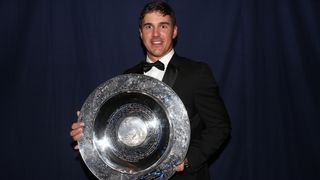 Brooks Koepka with the 2014 Rookie of the Year award