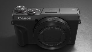 Canon PowerShot G7 X Mark III Anniversary Edition in graphite, on a graphite-type surface