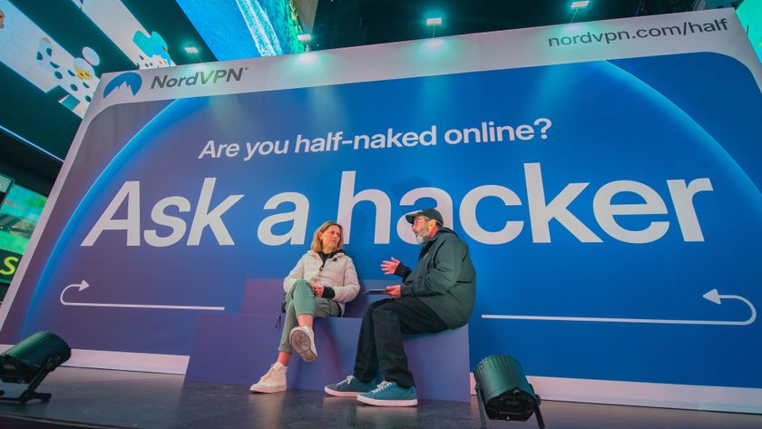 A woman speaks with a hacker at NordVPN&#039;s Ask A Hacker event
