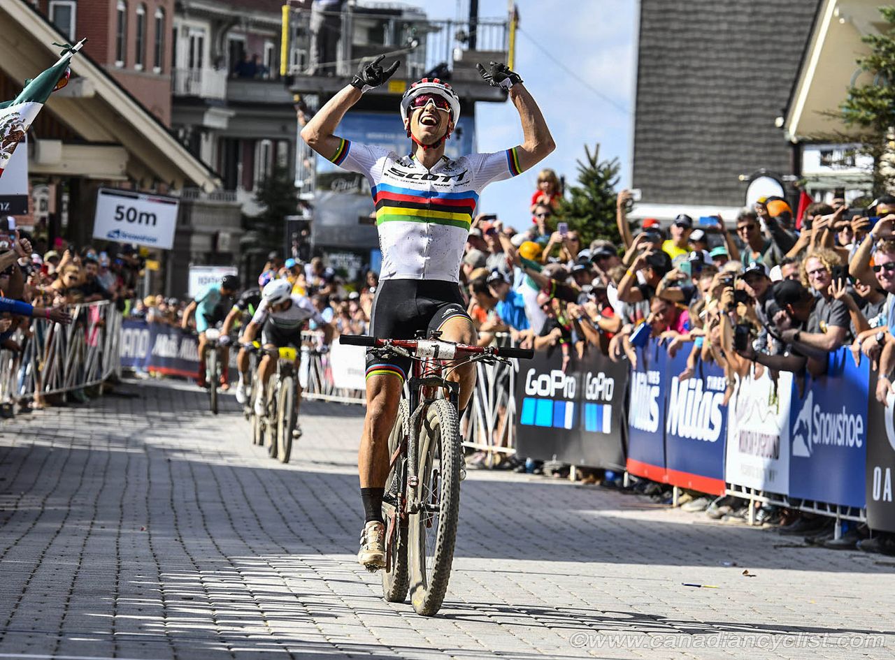 Nino Schurter celebrating his overall World Cup win